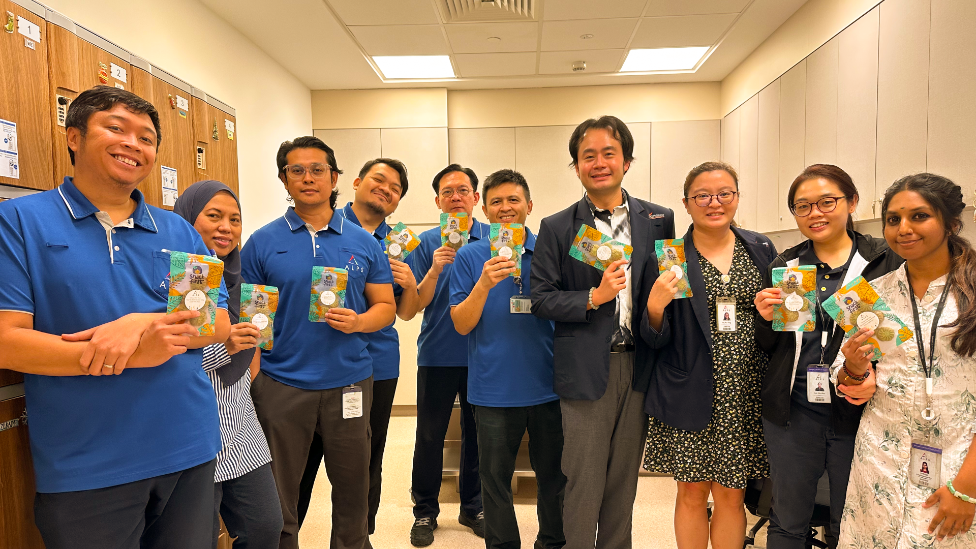 Image of ALPS staff with their Hari Raya festive goodies 